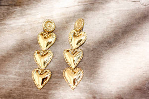 THE TRIPLE HEARTS GOLD